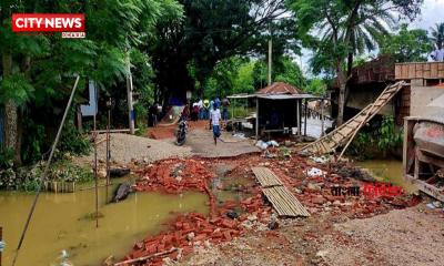 নামছে বন্যার পানি, ভেসে উঠছে ক্ষতচিহ্ন